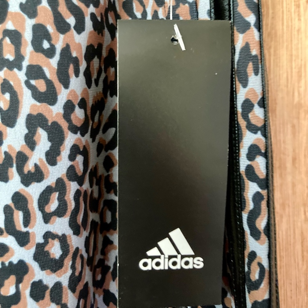 Girls Addias leopard print wind pants size 16